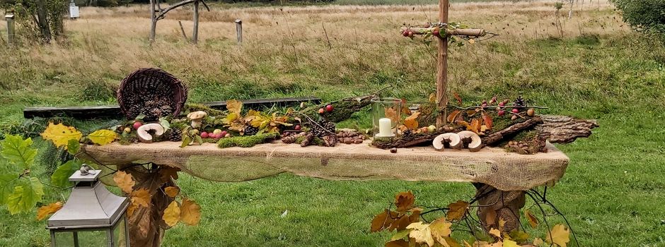 Gottesdienst mit zwei Taufen im Wald