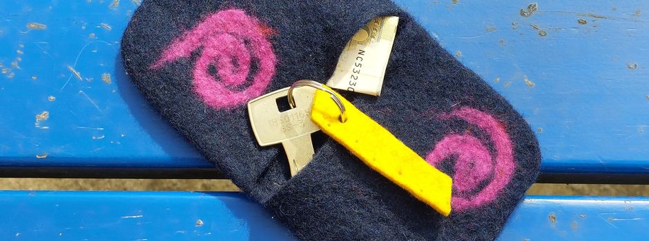 Klappetui und Armstulpen