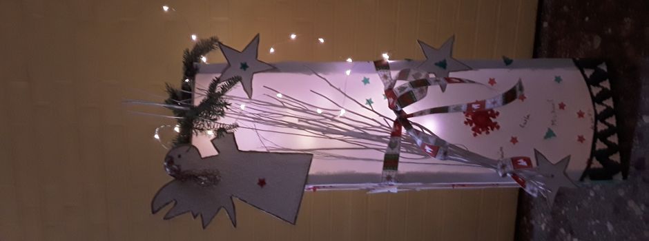 Kernzeitbetreuung eröffnet das erste Adventsfenster