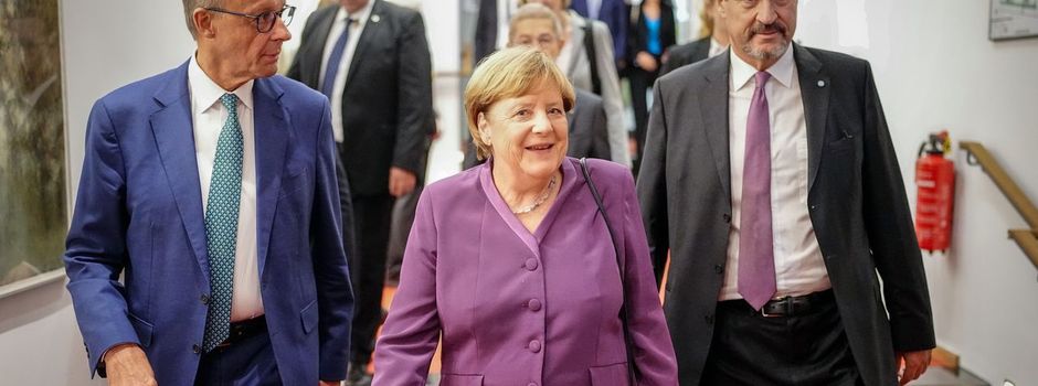 Merkel lässt sich feiern - Merz würdigt einstige Rivalin